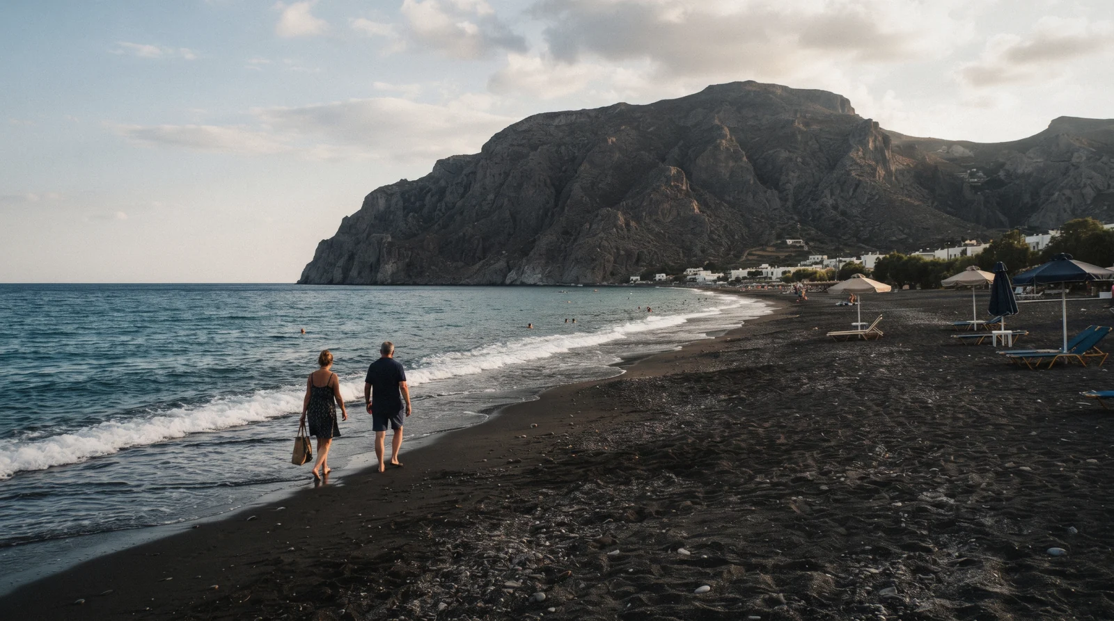 Perissa black sand beach in the late afternoon, santorini beaches, Santorini Greece